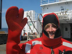 Deborah Campbell participating in an abandon ship drill aboard NOAA Ship Nancy Foster. 