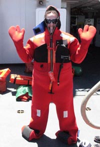 NOAA Teacher at Sea Jamie Morris suited for abandon-ship drill.