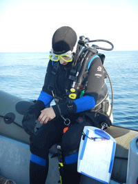 Lauren Hessmann prepares for a fish survey dive in Gray's Reef National Marine Sancuary.