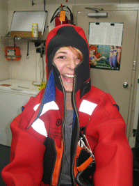 Sarah Webb sutied in survival suit for abandon ship drill. 