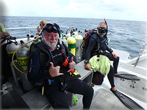 Peter Auster (l) and Jeff Godfrey (r) prepare for a dive to survey predator diversity and behavior.